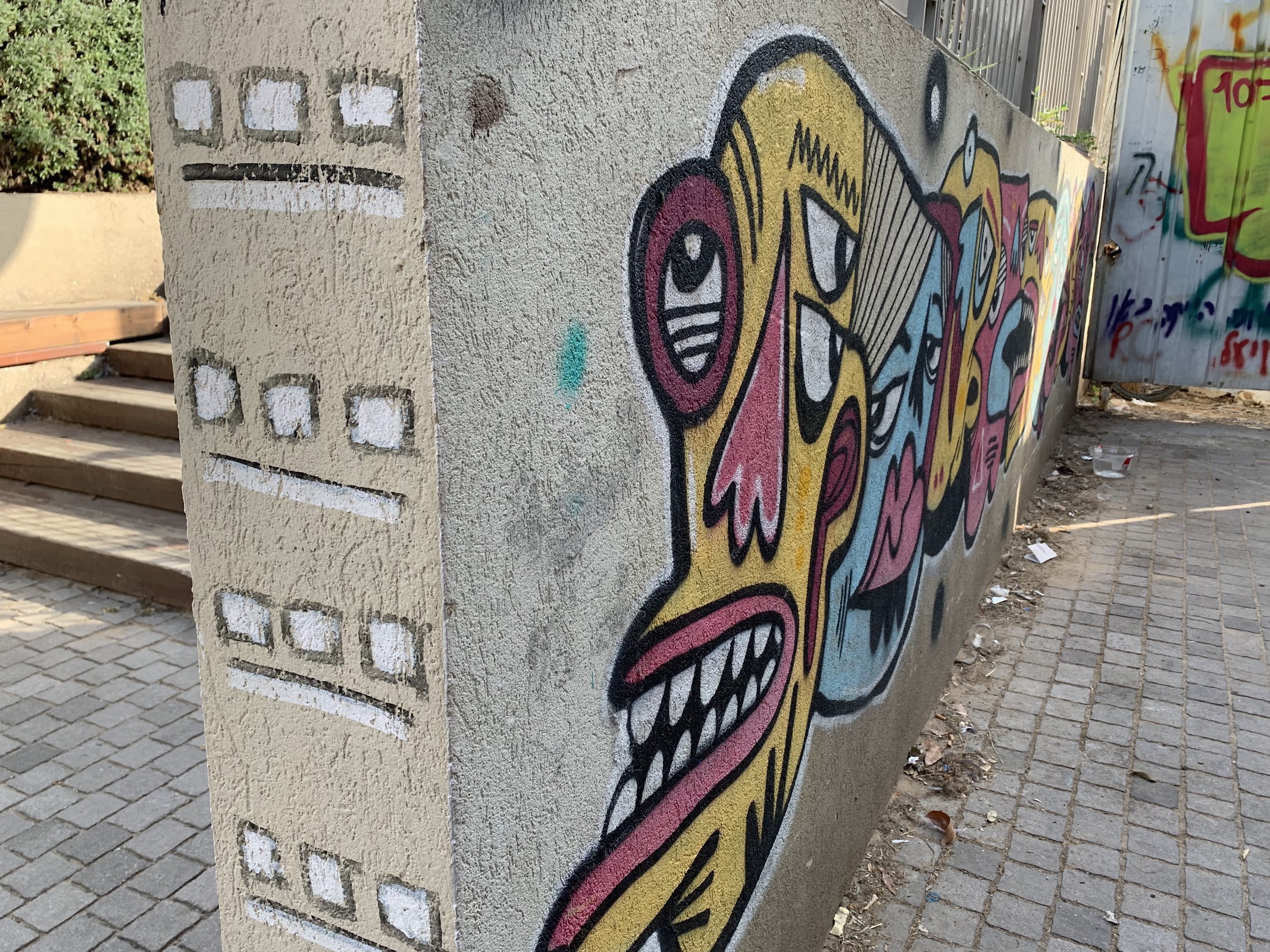 Graffiti on urban masonry — the kind of commercial and municipal surface Red Claw Laser removes graffiti from without chemicals or damage
